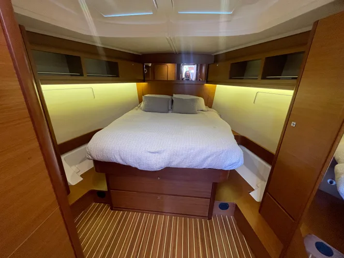 Send Me Yacht Photos Pics Luxurious cabin interior of 2018 Dufour 460 Grand Large yacht with cozy bedding.