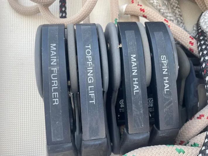 Send Me Yacht Photos Pics Sailing equipment on a 2018 Dufour 460 Grand Large yacht, featuring labeled rope clutches.