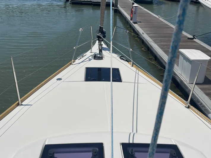 Send Me Yacht Photos Pics Bow view of 2018 Dufour 460 Grand Large yacht docked at marina.