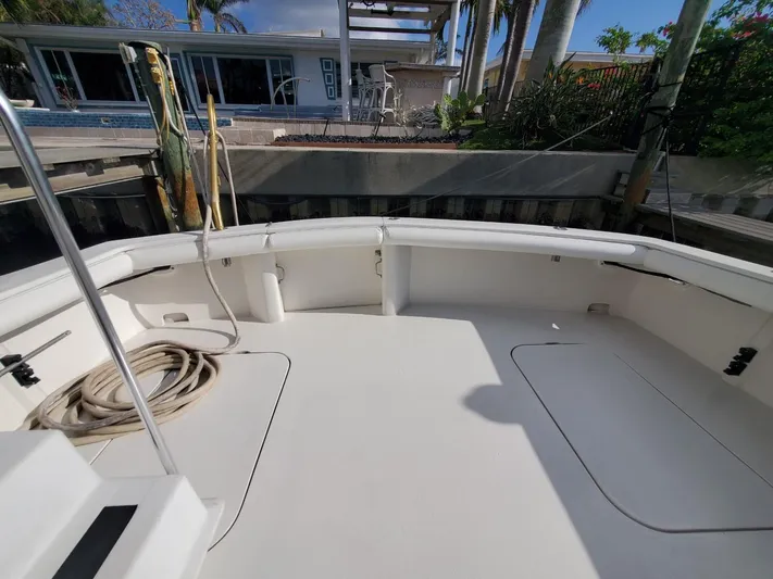 Anchor Management Yacht Photos Pics 1988 Post 46 Sportfish boat deck with clean, spacious layout and dockside view.