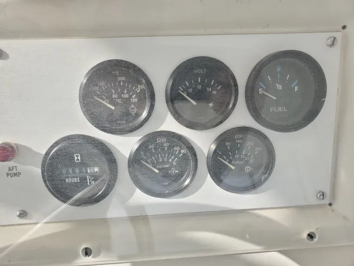 Anchor Management Yacht Photos Pics Dashboard gauges of a 1988 Post 46 Sportfish boat, showing various engine metrics.