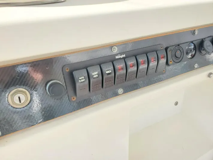 Anchor Management Yacht Photos Pics Control panel on 1988 Post 46 Sportfish boat with labeled switches.