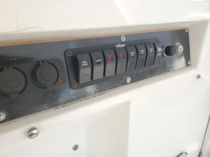 Anchor Management Yacht Photos Pics Control panel on 1988 Post 46 Sportfish boat with switches and outlets.