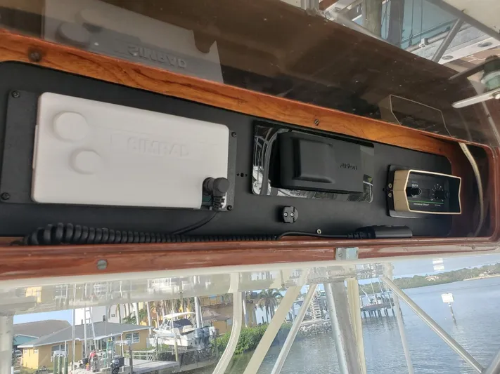 Anchor Management Yacht Photos Pics 1988 Post 46 Sportfish boat electronics panel with waterfront view.