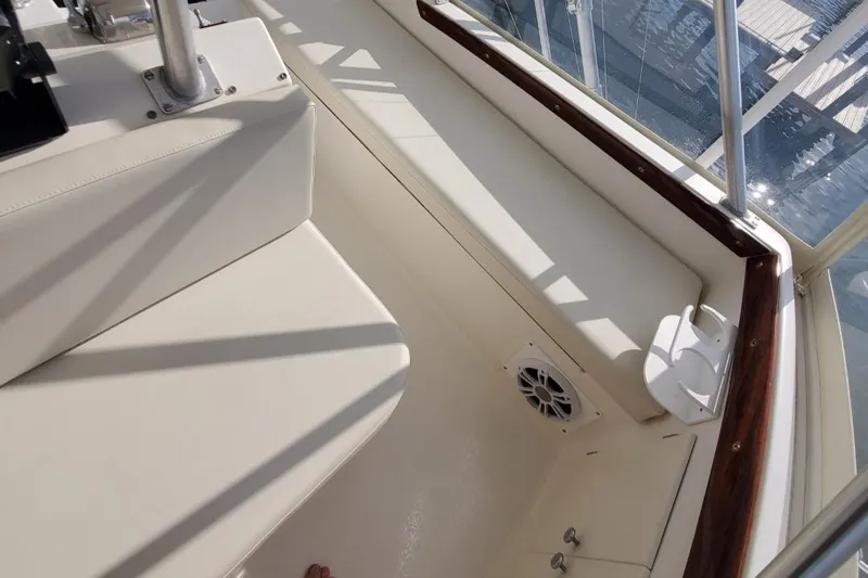 Anchor Management Yacht Photos Pics 1988 Post 46 Sportfish boat interior with white seating and wood trim.