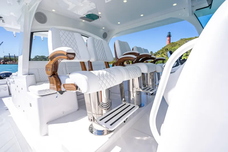  Yacht Photos Pics Luxurious seating on 2026 HCB 65 Estrella yacht with elegant design and scenic backdrop.