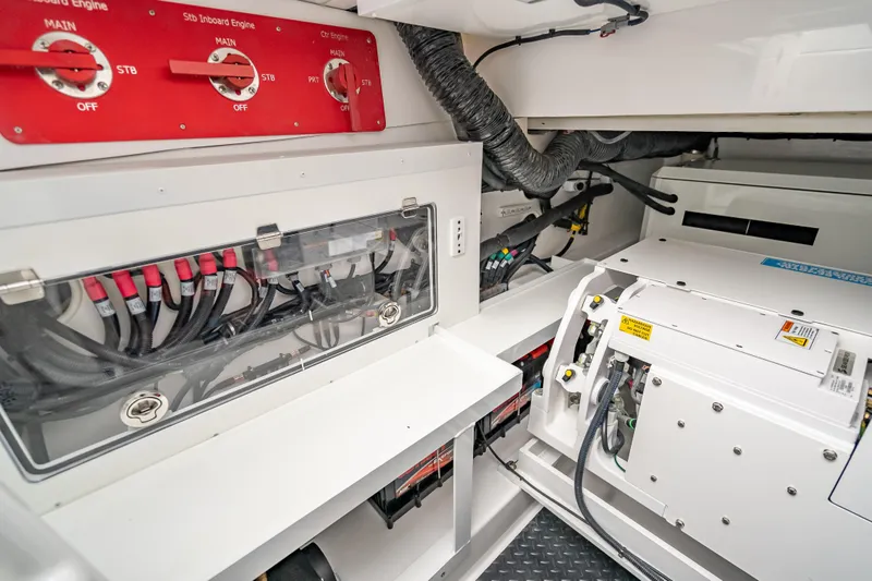  Yacht Photos Pics Engine room of 2026 HCB 65 Estrella, showcasing wiring and control panels.