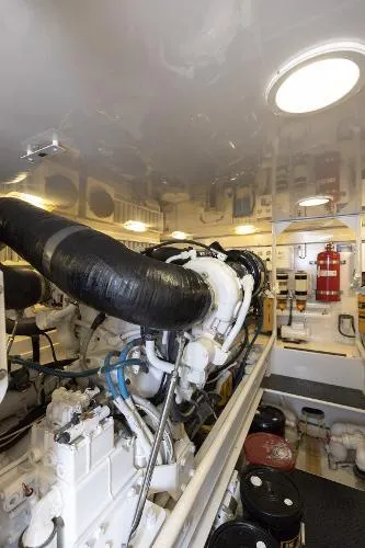 Chona Yacht Photos Pics Engine room of 2007 Viking 64 Enclosed yacht, showcasing machinery and equipment.