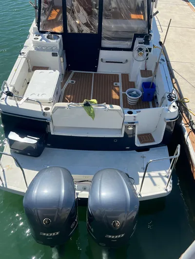  Yacht Photos Pics 2017 Cutwater C-302 Sport Coupe with dual engines, docked at a marina.