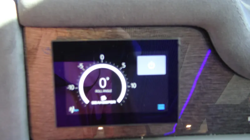 Chapter II Yacht Photos Pics Digital display on 2023 Riviera 6000 Sport Yacht dashboard showing roll angle.