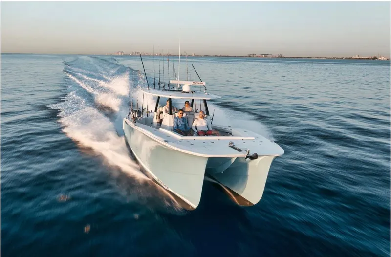 Hull 136 Yacht Photos Pics 2025 Hammer Yachts HammerCat 35 cruising on open water at high speed.