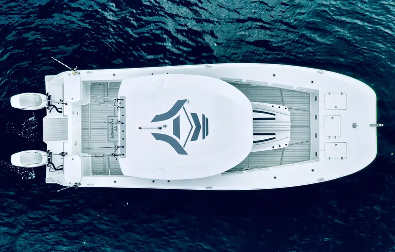 Hull 136 Yacht Photos Pics Top view of 2025 Hammer Yachts HammerCat 35 on water, showcasing sleek design and twin engines.