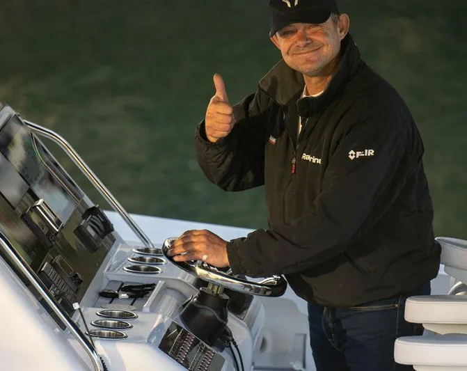 Hull 136 Yacht Photos Pics Man giving thumbs up on Hammer Yachts HammerCat 35, 2025 model.
