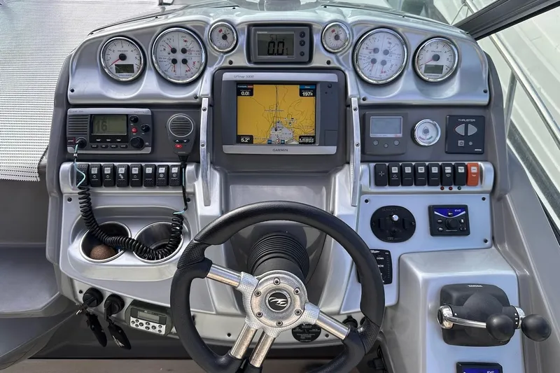 Key West Yacht Photos Pics Control panel of a 2011 Monterey 315 SCR boat with navigation and communication systems.