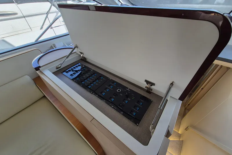 Yacht Photos Pics 2023 Azimut Fly 68 yacht interior with open control panel, showcasing modern design and functionality.