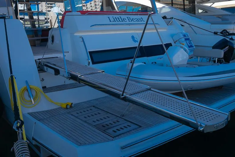  Yacht Photos Pics Luxury yacht Prestige 680, 2017 model, with a boarding platform and tender.