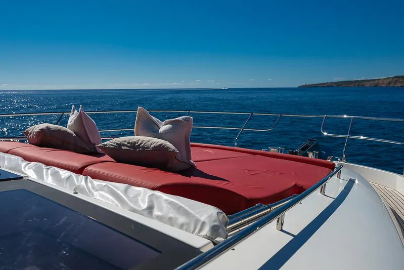  Yacht Photos Pics Luxurious 2017 Prestige 680 yacht with sunbed, ocean view, and clear blue sky.