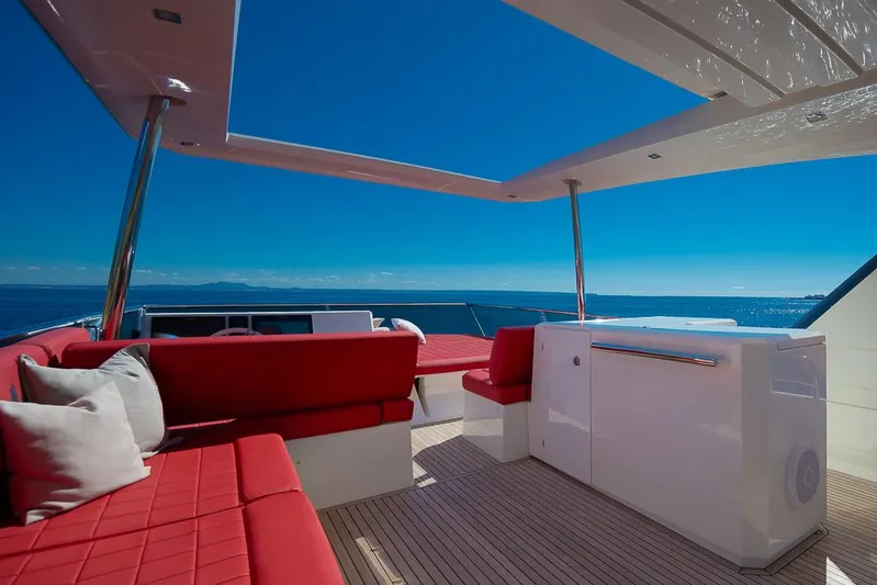 Yacht Photos Pics Luxurious 2017 Prestige 680 yacht with red seating and ocean view.