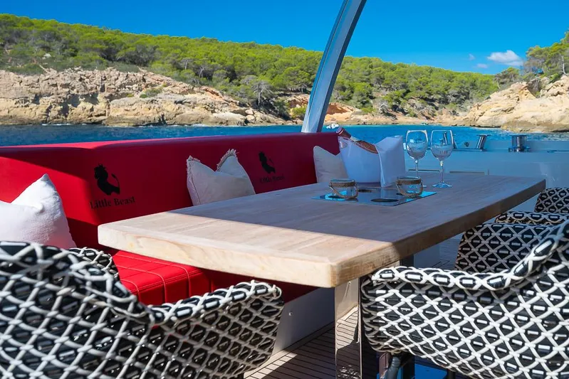  Yacht Photos Pics Luxurious Prestige 680 yacht deck with elegant seating and scenic coastal view, 2017 model.