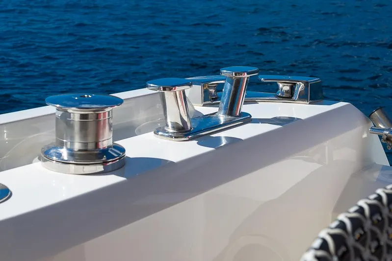  Yacht Photos Pics Sleek chrome fittings on a 2017 Prestige 680 yacht against a blue ocean backdrop.