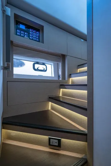  Yacht Photos Pics Staircase with ambient lighting on a 2017 Prestige 680 yacht interior.