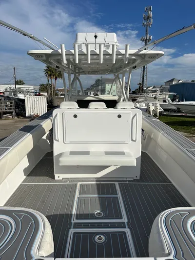  Yacht Photos Pics 2011 SeaHunter Center Console boat with spacious deck and seating.