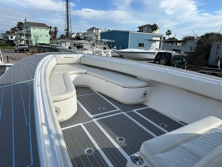  Yacht Photos Pics 2011 SeaHunter Center Console boat with spacious seating and modern design.