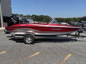Red 2013 Stratos 486 SF boat on trailer, parked outdoors, featuring Mercury engine.