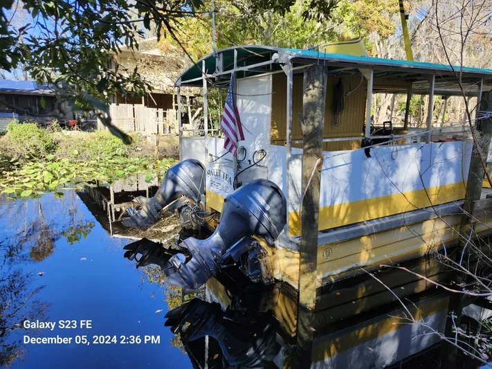 Sweet Tea Yacht Photos Pics 2016 Rover Marine Carolina Rover 40 docked on a serene waterway with lush surroundings.