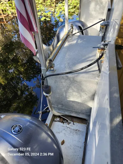Sweet Tea Yacht Photos Pics 2016 Rover Marine Carolina Rover 40 boat deck with Yamaha motor and American flag.