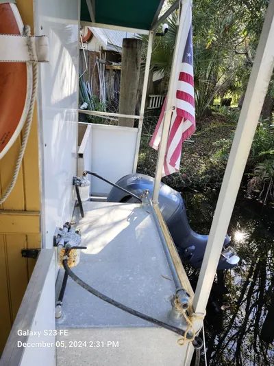 Sweet Tea Yacht Photos Pics 2016 Rover Marine Carolina Rover 40 docked with American flag and life preserver.