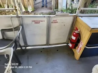 Sweet Tea Yacht Photos Pics Interior of 2016 Rover Marine Carolina Rover 40 with emergency exit and fire extinguisher.