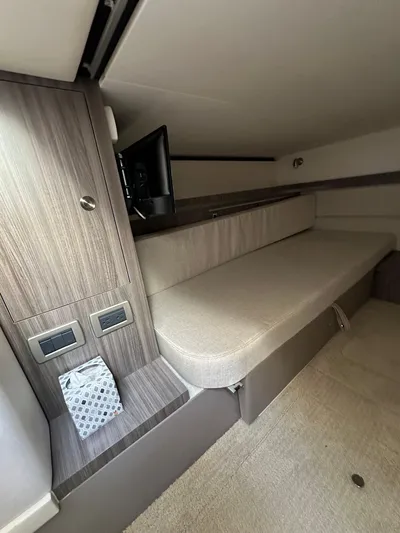  Yacht Photos Pics 2020 Sea Ray Sundancer 320 cabin interior with seating and modern amenities.