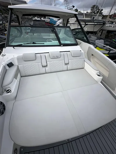  Yacht Photos Pics 2020 Sea Ray Sundancer 320 with spacious white seating area and modern design.