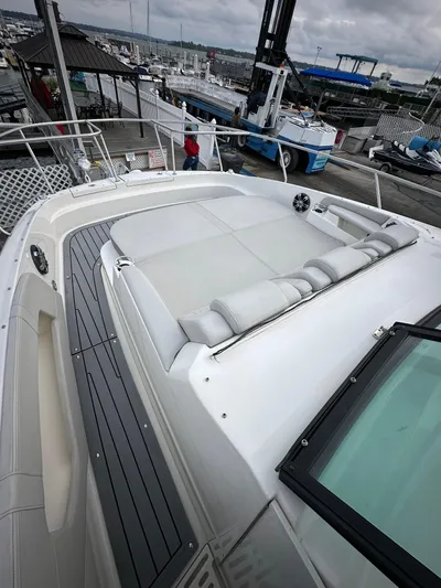  Yacht Photos Pics 2020 Sea Ray Sundancer 320 yacht with spacious deck and seating at marina.