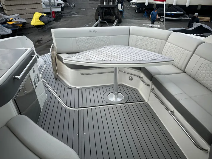  Yacht Photos Pics 2020 Sea Ray Sundancer 320 boat interior with sleek seating and modern table design.