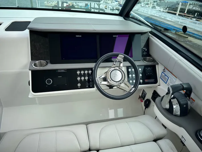  Yacht Photos Pics 2020 Sea Ray Sundancer 320 helm with modern controls and dual displays.