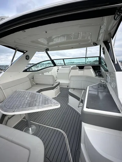  Yacht Photos Pics 2020 Sea Ray Sundancer 320 interior with sleek seating and modern design.