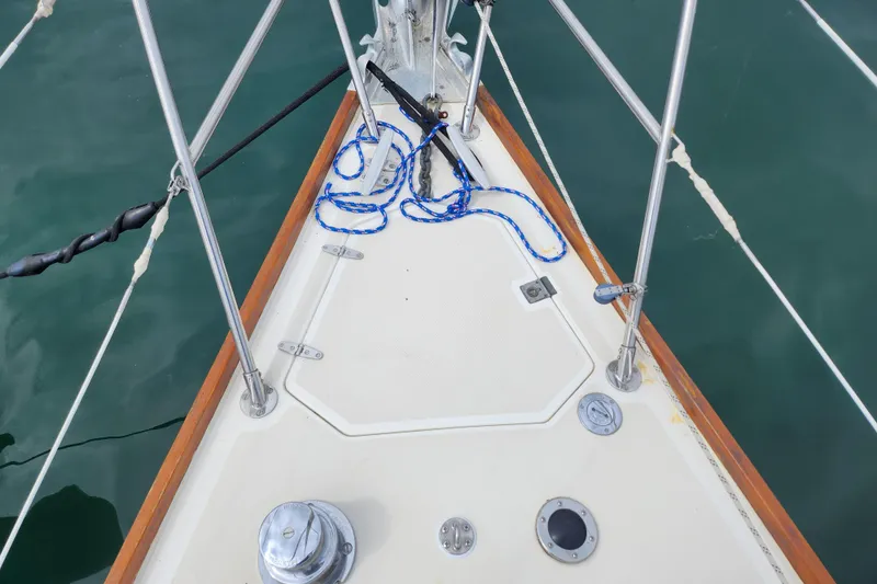 Isola Bella Yacht Photos Pics Bow of 1988 Sabre 42 sailboat with ropes and fittings on deck.