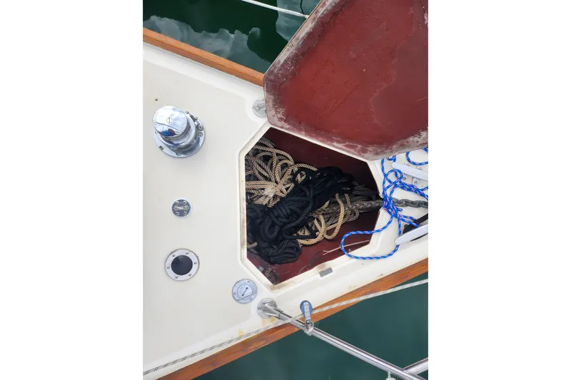 Isola Bella Yacht Photos Pics Open hatch on 1988 Sabre 42 sailboat with ropes and winch visible.