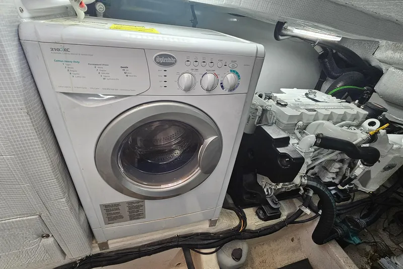  Yacht Photos Pics Washing machine and engine in 2009 Sabre 42 Express boat interior.