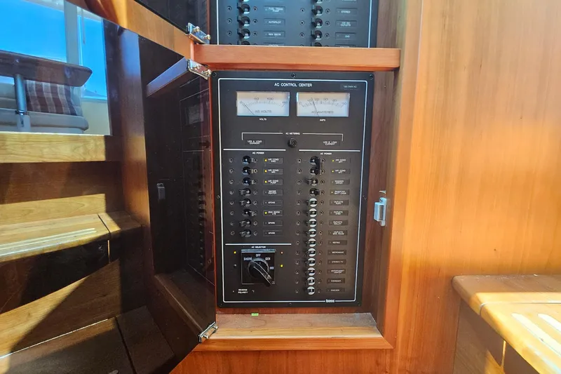  Yacht Photos Pics Electrical control panel inside 2009 Sabre 42 Express yacht, featuring switches and meters.