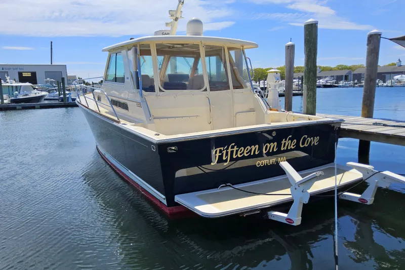  Yacht Photos Pics 2009 Sabre 42 Express boat named "Fifteen on the Cove" docked in Cotuit, MA.