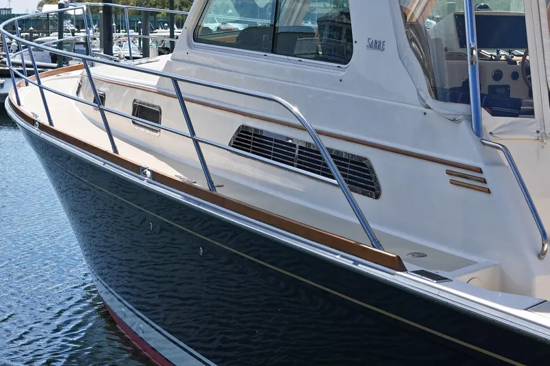  Yacht Photos Pics 2009 Sabre 42 Express yacht docked, showcasing sleek design and polished railings.