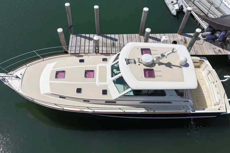  Yacht Photos Pics 2009 Sabre 42 Express yacht docked at marina, aerial view.