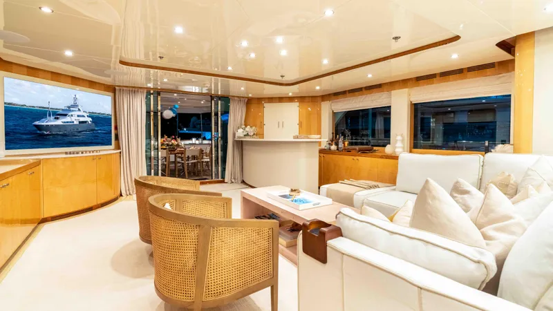 Stay Salty Yacht Photos Pics Luxurious yacht interior with elegant seating, large windows, and modern decor, Horizon Premier 135, 2010.