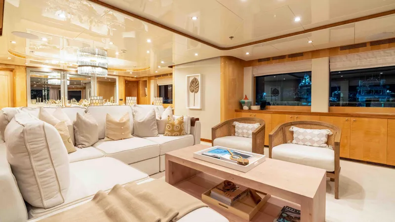 Stay Salty Yacht Photos Pics Luxurious yacht interior with plush seating, elegant decor, and ambient lighting, Horizon Premier 135, 2010.