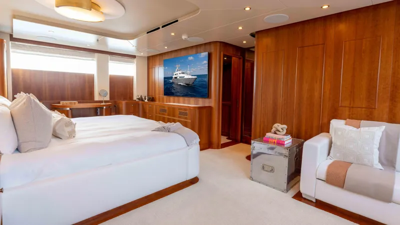 Stay Salty Yacht Photos Pics Luxurious yacht bedroom with wooden decor, Horizon Premier 135, 2010 model.