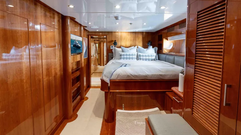 Stay Salty Yacht Photos Pics Luxurious yacht bedroom with wooden interiors, Horizon Premier 135, 2010 model.