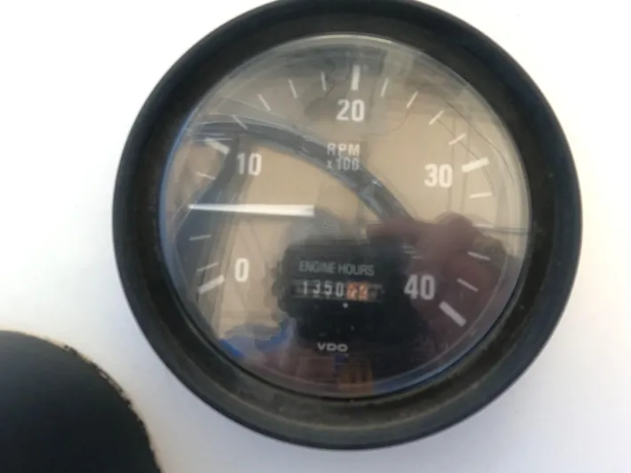  Yacht Photos Pics Close-up of engine hour meter on 2002 Luhrs 34 Convertible boat.